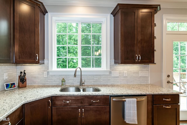 1820 Yates Wheel Way, Raleigh, NC 27606 - kitchen with dishwasher, a sink, dark brown cabinets, ornamental molding, and backsplash
