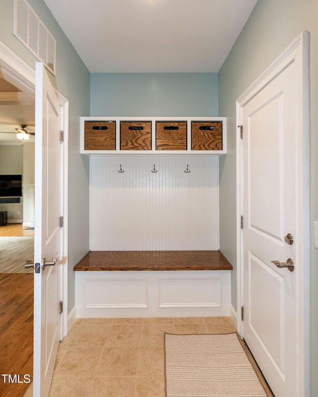 1820 Yates Wheel Way, Raleigh, NC 27606 - mudroom with ceiling fan, light tile patterned floors, and baseboards