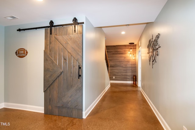 1820 Yates Wheel Way, Raleigh, NC 27606 - hallway with baseboards, a barn door, recessed lighting, and concrete floors