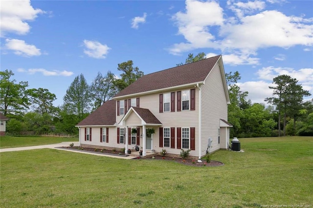 119 Woodbine Dr, Raeford, NC 28376 - colonial-style house with a front yard
