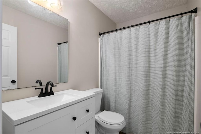 119 Woodbine Dr, Raeford, NC 28376 - full bath with a textured ceiling, toilet, and vanity