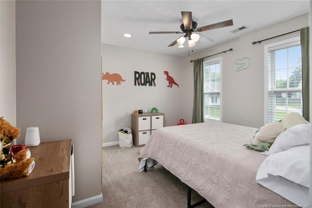 119 Woodbine Dr, Raeford, NC 28376 - carpeted bedroom featuring baseboards and a ceiling fan