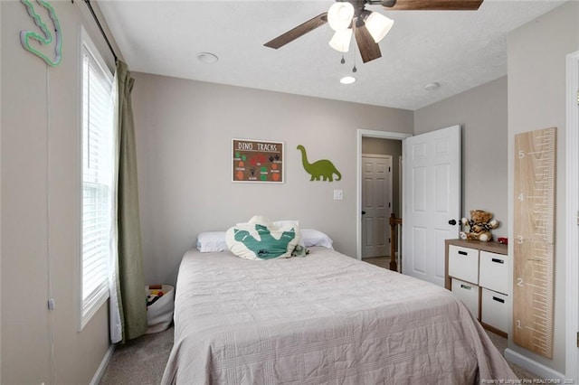 119 Woodbine Dr, Raeford, NC 28376 - bedroom with carpet floors, ceiling fan, and baseboards