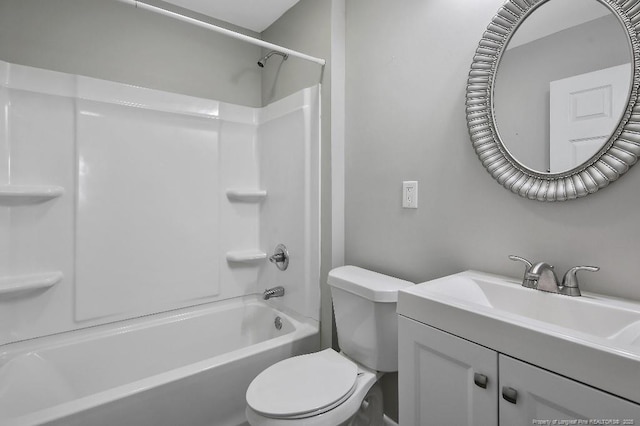 bathroom featuring vanity,  shower combination, and toilet