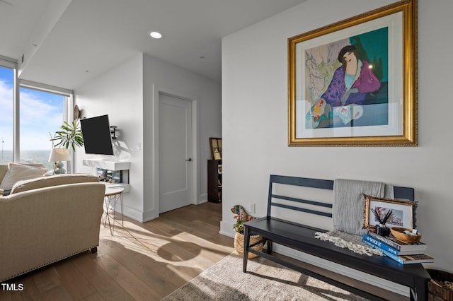 110 N Corcoran St Unit 2101, Durham, NC 27701 - living room featuring recessed lighting, baseboards, and wood finished floors