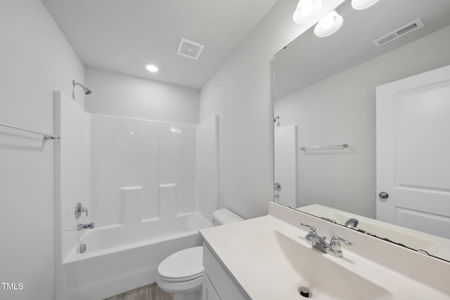 full bathroom featuring bathtub / shower combination, visible vents, vanity, and toilet