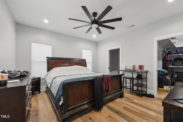 bedroom featuring light wood-style floors, visible vents, and recessed lighting