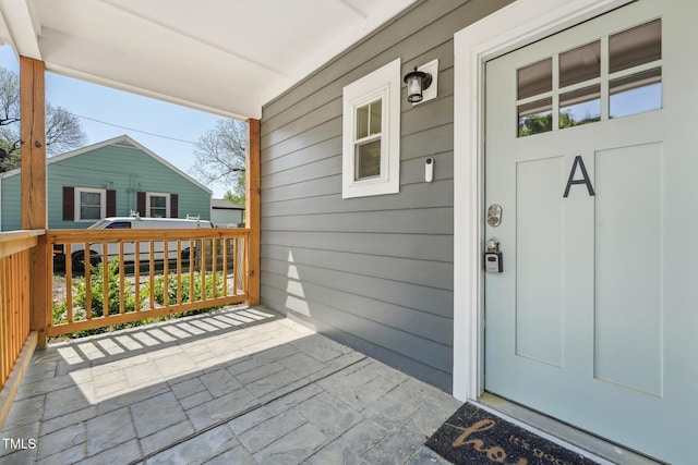entrance to property with covered porch