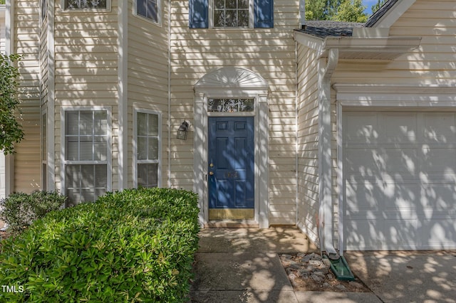 1031 Lake Moraine Pl, Raleigh, NC 27607 - property entrance with a garage
