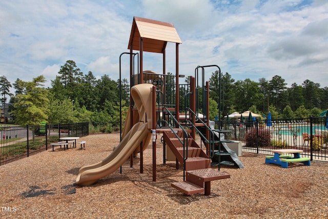 community jungle gym with fence