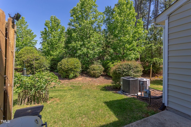 view of yard featuring central AC