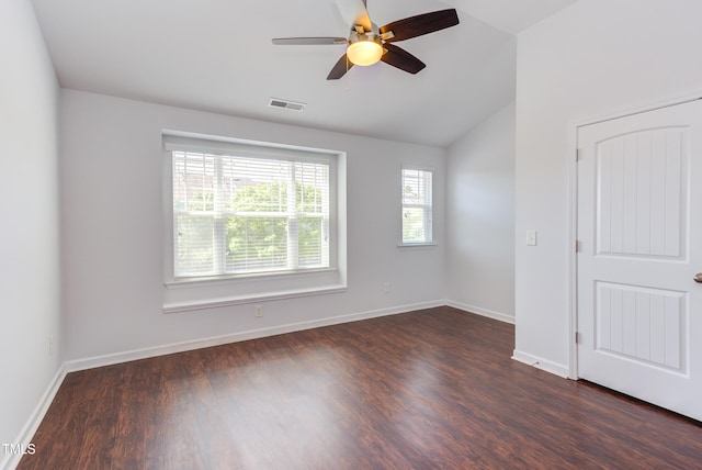 313 Carthage Ct, Durham, NC 27703 - spare room featuring a ceiling fan, visible vents, lofted ceiling, and dark wood-type flooring