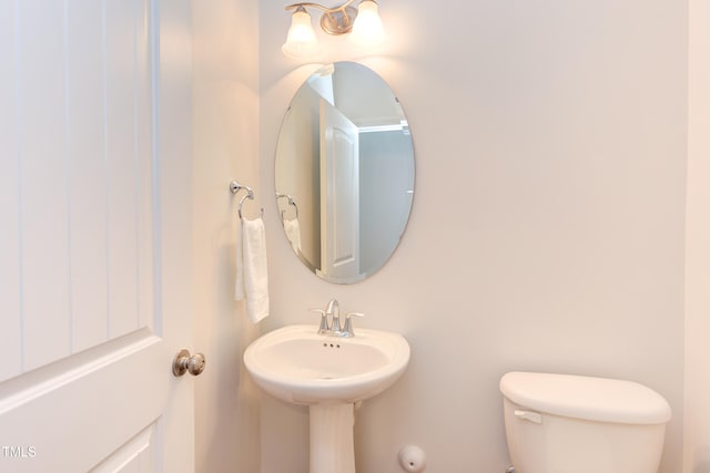 313 Carthage Ct, Durham, NC 27703 - half bathroom featuring toilet
