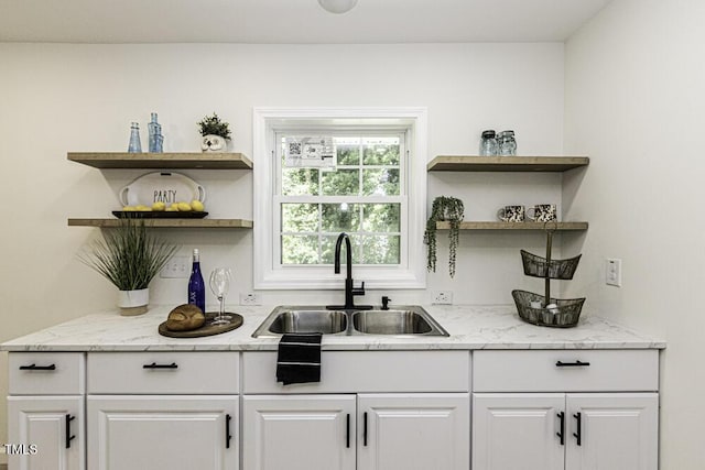 bar featuring a sink