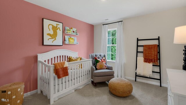 320 Hanging Elm Ln, Fuquay Varina, NC 27526 - bedroom with a nursery area, carpet floors, and baseboards