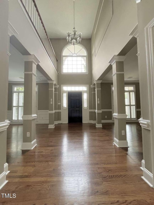 102 Traviliah Oaks Ln, Cary, NC 27518 - foyer entrance featuring healthy amount of natural light, dark wood-type flooring, and a towering ceiling