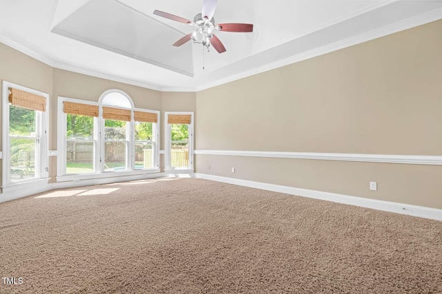 102 Traviliah Oaks Ln, Cary, NC 27518 - empty room featuring carpet floors, a ceiling fan, a raised ceiling, baseboards, and ornamental molding