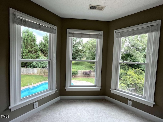 102 Traviliah Oaks Ln, Cary, NC 27518 - unfurnished room featuring carpet, baseboards, and a textured ceiling