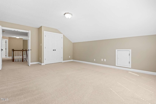 102 Traviliah Oaks Ln, Cary, NC 27518 - bonus room featuring light carpet, vaulted ceiling, and baseboards