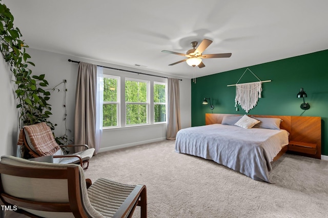 bedroom featuring visible vents, carpet, ceiling fan, and baseboards