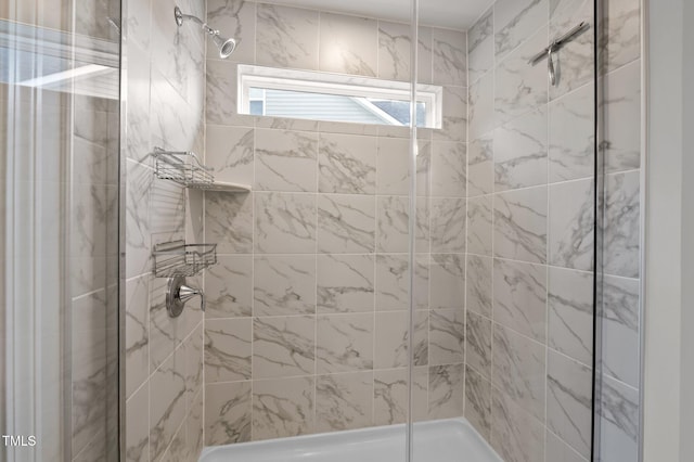 bathroom featuring a stall shower