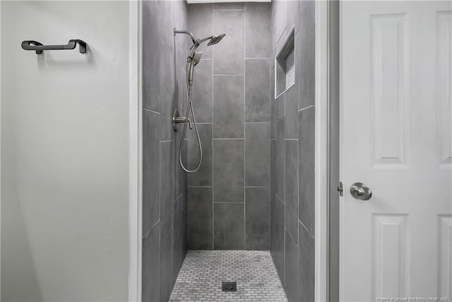 bathroom with a stall shower