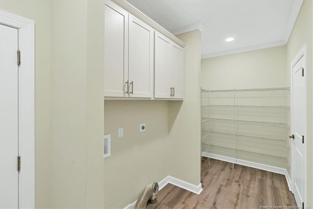 45 Martin Dr, Whispering Pines, NC 28327 - washroom with hookup for an electric dryer, wood finished floors, recessed lighting, cabinet space, and washer hookup