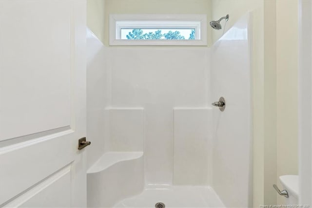 45 Martin Dr, Whispering Pines, NC 28327 - bathroom featuring a shower and toilet