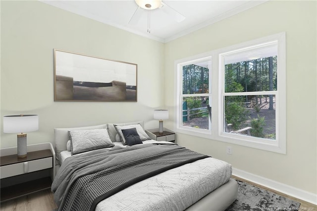 45 Martin Dr, Whispering Pines, NC 28327 - bedroom with wood finished floors and crown molding