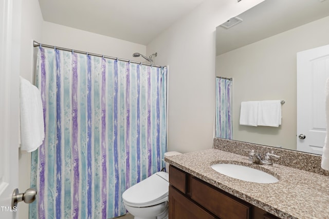 full bath with a shower with shower curtain, visible vents, toilet, and vanity