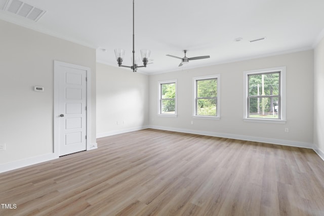 1448A Maplewood Dr, Durham, NC 27704 - spare room with ornamental molding, healthy amount of natural light, light wood-style flooring, baseboards, and a ceiling fan