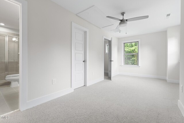 1448A Maplewood Dr, Durham, NC 27704 - unfurnished bedroom with attic access, baseboards, carpet flooring, ensuite bath, and a ceiling fan