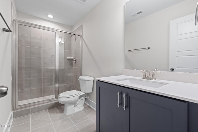 1448A Maplewood Dr, Durham, NC 27704 - full bathroom featuring baseboards, toilet, vanity, tile patterned flooring, and a stall shower