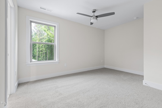 1448A Maplewood Dr, Durham, NC 27704 - empty room with a ceiling fan, carpet flooring, and baseboards