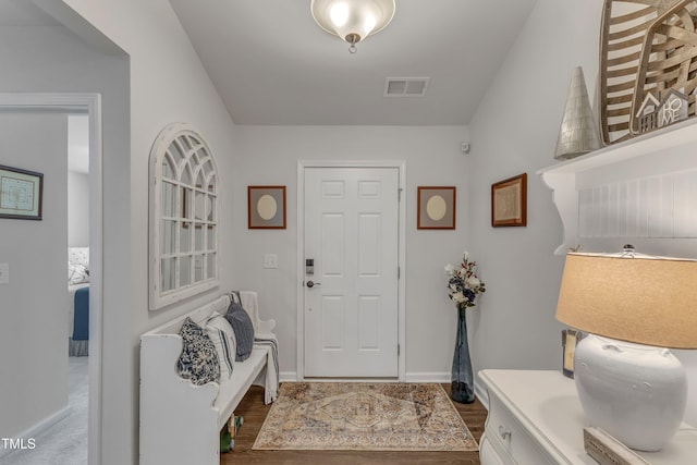 entrance foyer featuring baseboards