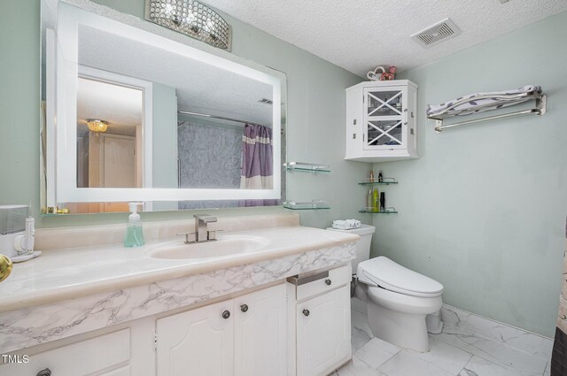 full bathroom featuring a textured ceiling, visible vents, vanity, toilet, and marble finish floor