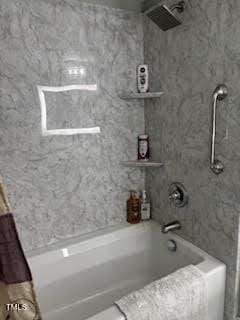full bathroom featuring bathtub / shower combination