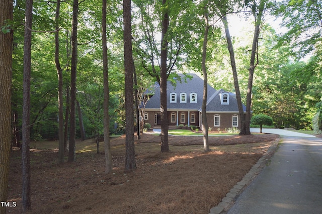5504 Spring Bluffs Ln, Raleigh, NC 27606 - view of front of house featuring roof with shingles