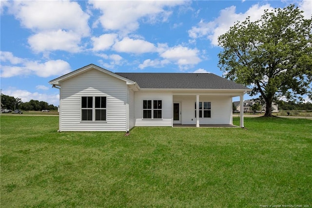 5566 Philippi Church Rd, Raeford, NC 28376 - rear view of property with a lawn