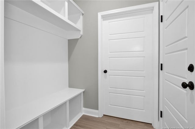 5566 Philippi Church Rd, Raeford, NC 28376 - mudroom featuring wood finished floors and baseboards