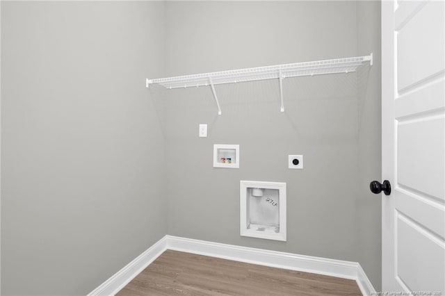 5566 Philippi Church Rd, Raeford, NC 28376 - washroom with hookup for an electric dryer, wood finished floors, baseboards, and hookup for a washing machine