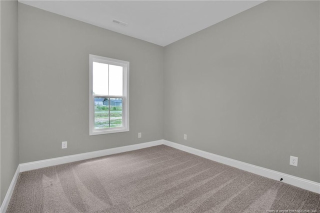5566 Philippi Church Rd, Raeford, NC 28376 - spare room with carpet floors and baseboards
