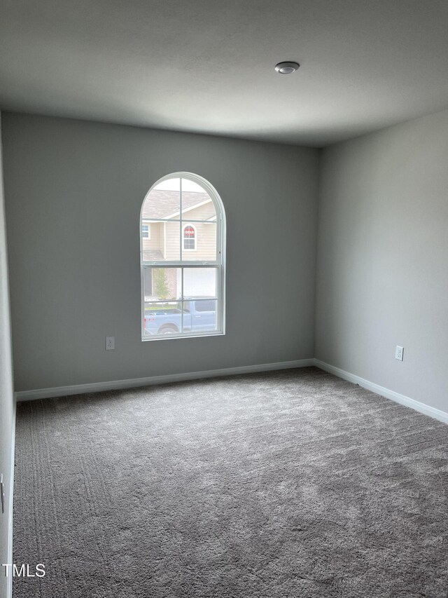 209 Lillian Ct, Roxboro, NC 27573 - carpeted empty room featuring baseboards
