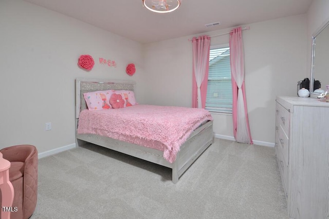 490 Mallard Loop Dr, Clayton, NC 27527 - bedroom featuring visible vents, baseboards, and light carpet