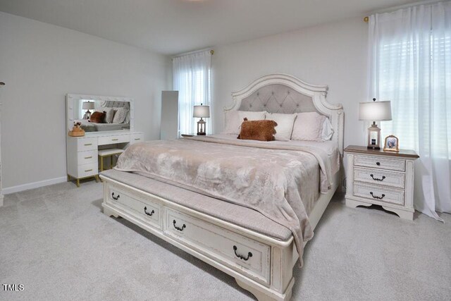 490 Mallard Loop Dr, Clayton, NC 27527 - bedroom featuring baseboards and light colored carpet