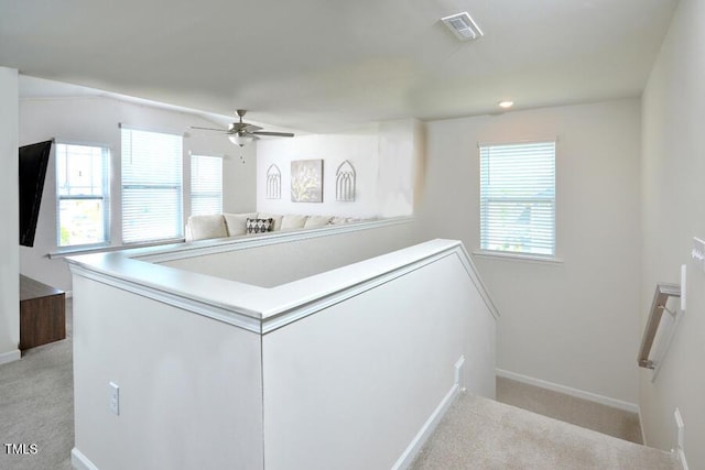 490 Mallard Loop Dr, Clayton, NC 27527 - staircase with baseboards, a ceiling fan, visible vents, and carpet