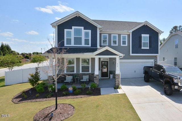 490 Mallard Loop Dr, Clayton, NC 27527 - craftsman-style home featuring fence, a front lawn, an attached garage, driveway, and a porch