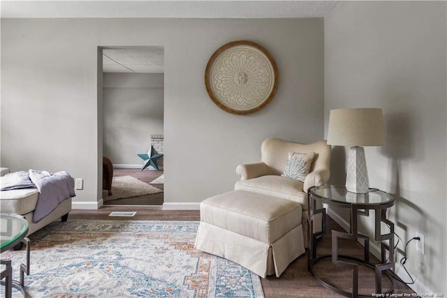 413 Lincoln Mckay Dr, Lillington, NC 27546 - sitting room with wood finished floors, visible vents, and baseboards