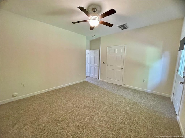 234 Hugh Shelton Loop, Fayetteville, NC 28301 - empty room featuring light colored carpet, baseboards, and a ceiling fan