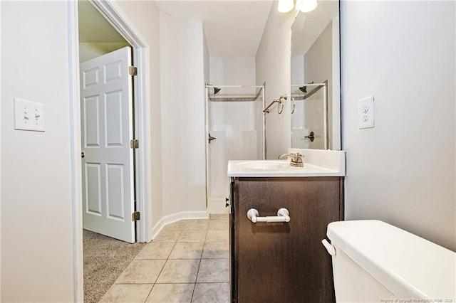 234 Hugh Shelton Loop, Fayetteville, NC 28301 - full bath featuring a shower, vanity, tile patterned floors, toilet, and baseboards